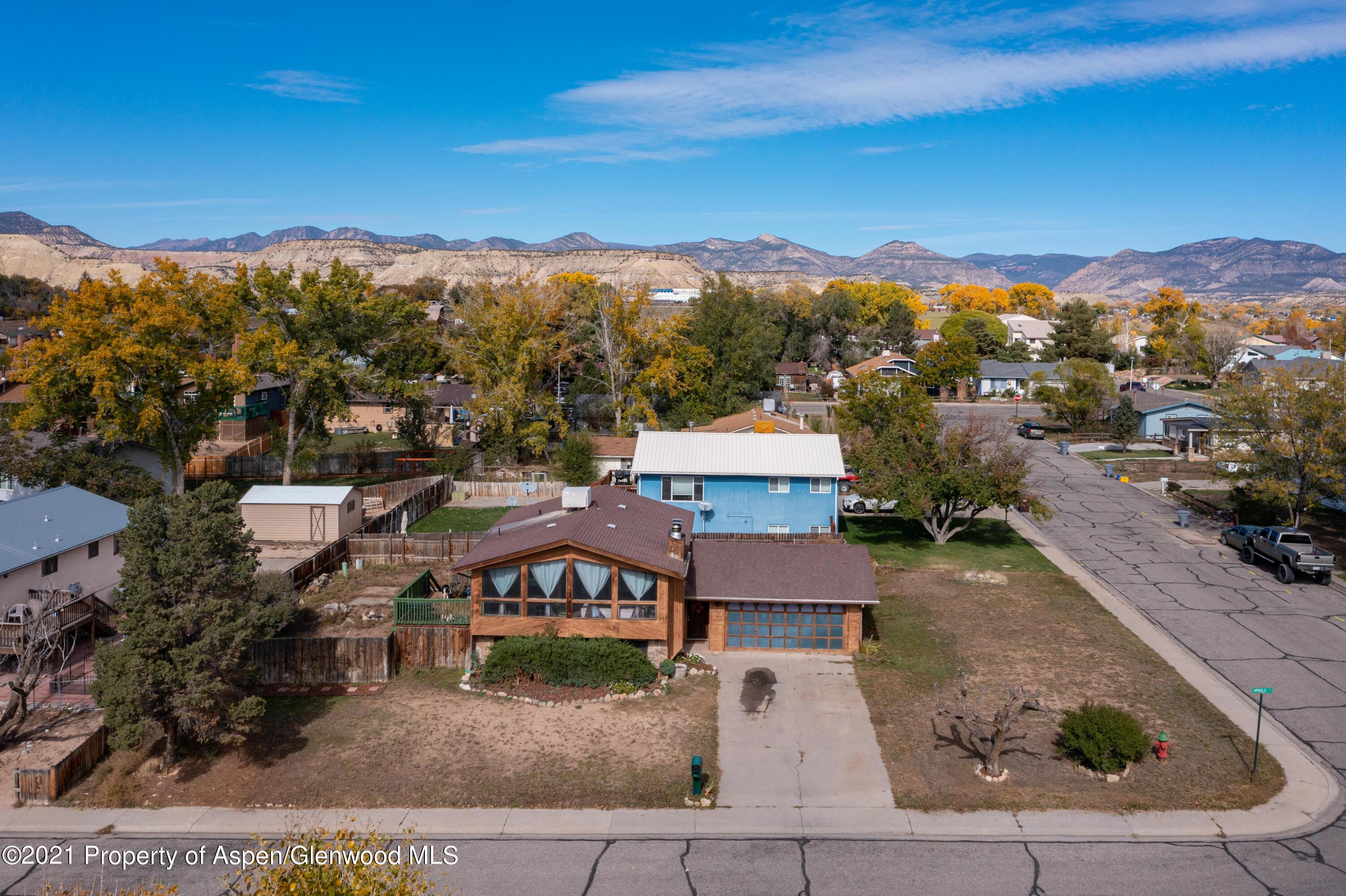 1002 Arnold Court Rifle, CO 81650 - Photo 3 of 15 an aerial view of residential houses with outdoor space
