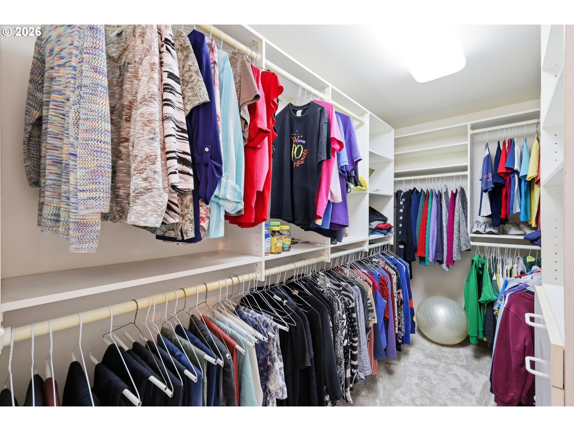 3379 South Lambert Street Eugene, OR 97405 - Photo 24 of 44 a view of walk in closet with clothes