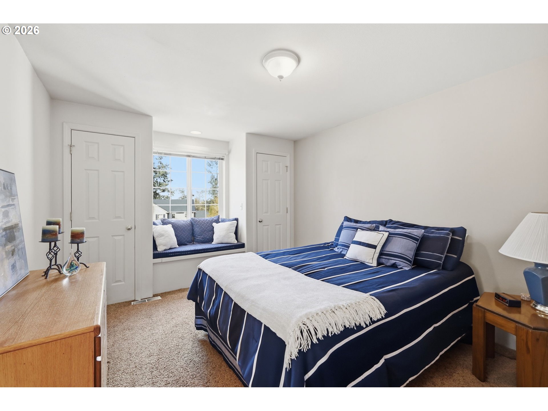 3379 South Lambert Street Eugene, OR 97405 - Photo 25 of 44 a bedroom with a bed and a table
