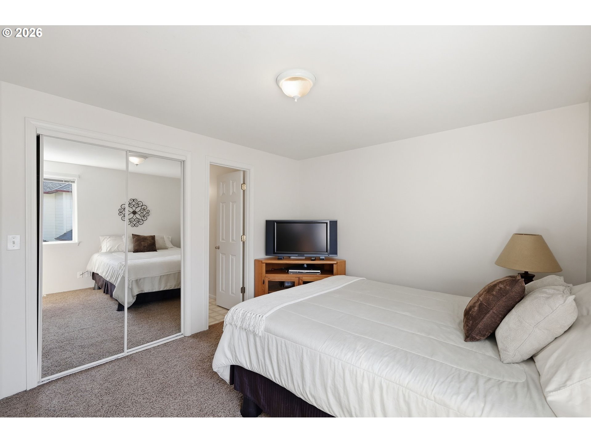 3379 South Lambert Street Eugene, OR 97405 - Photo 32 of 44 a bedroom with a bed and a couch