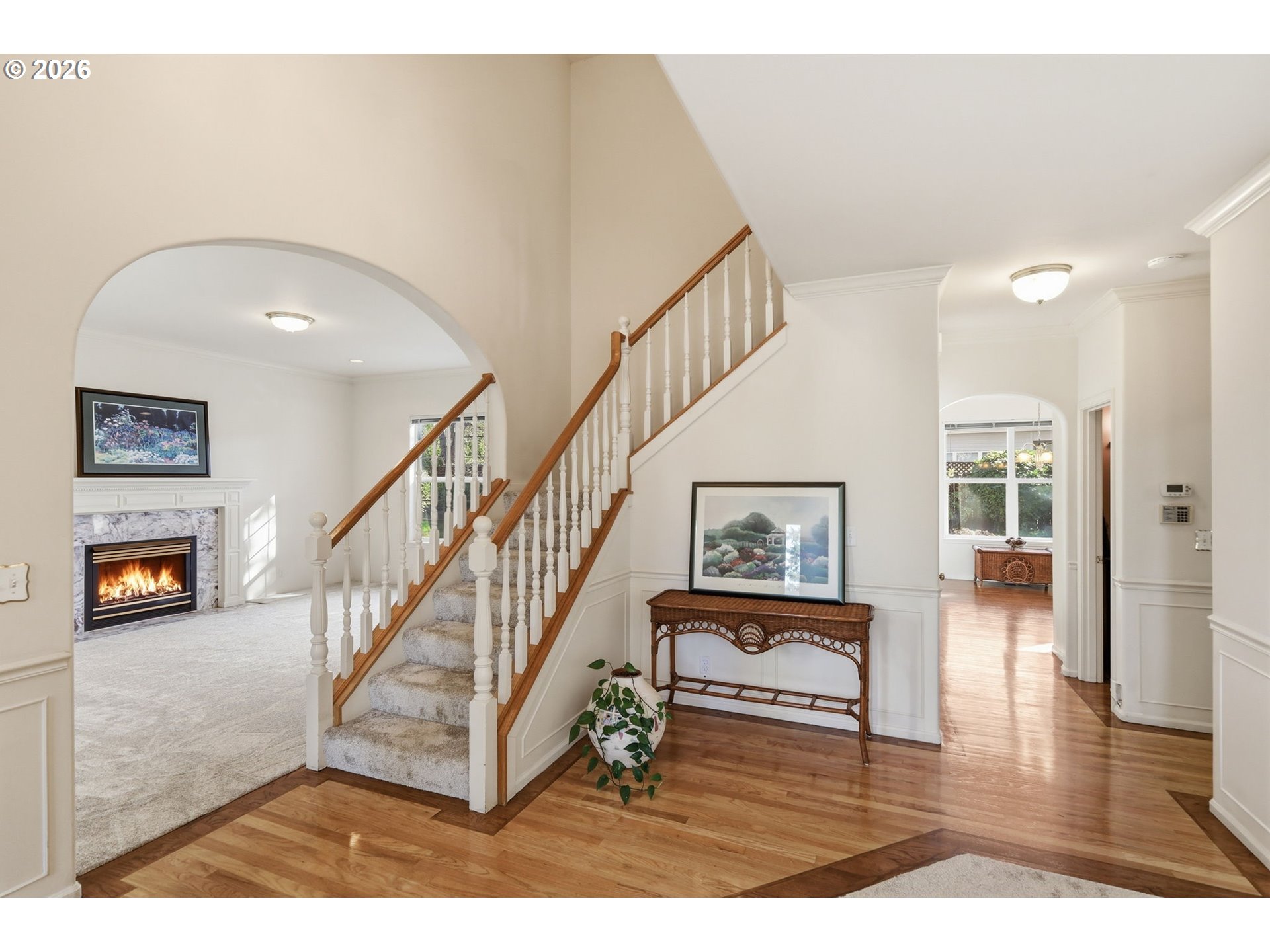 3379 South Lambert Street Eugene, OR 97405 - Photo 5 of 44 a view of a hallway with wooden floor windows and entryway
