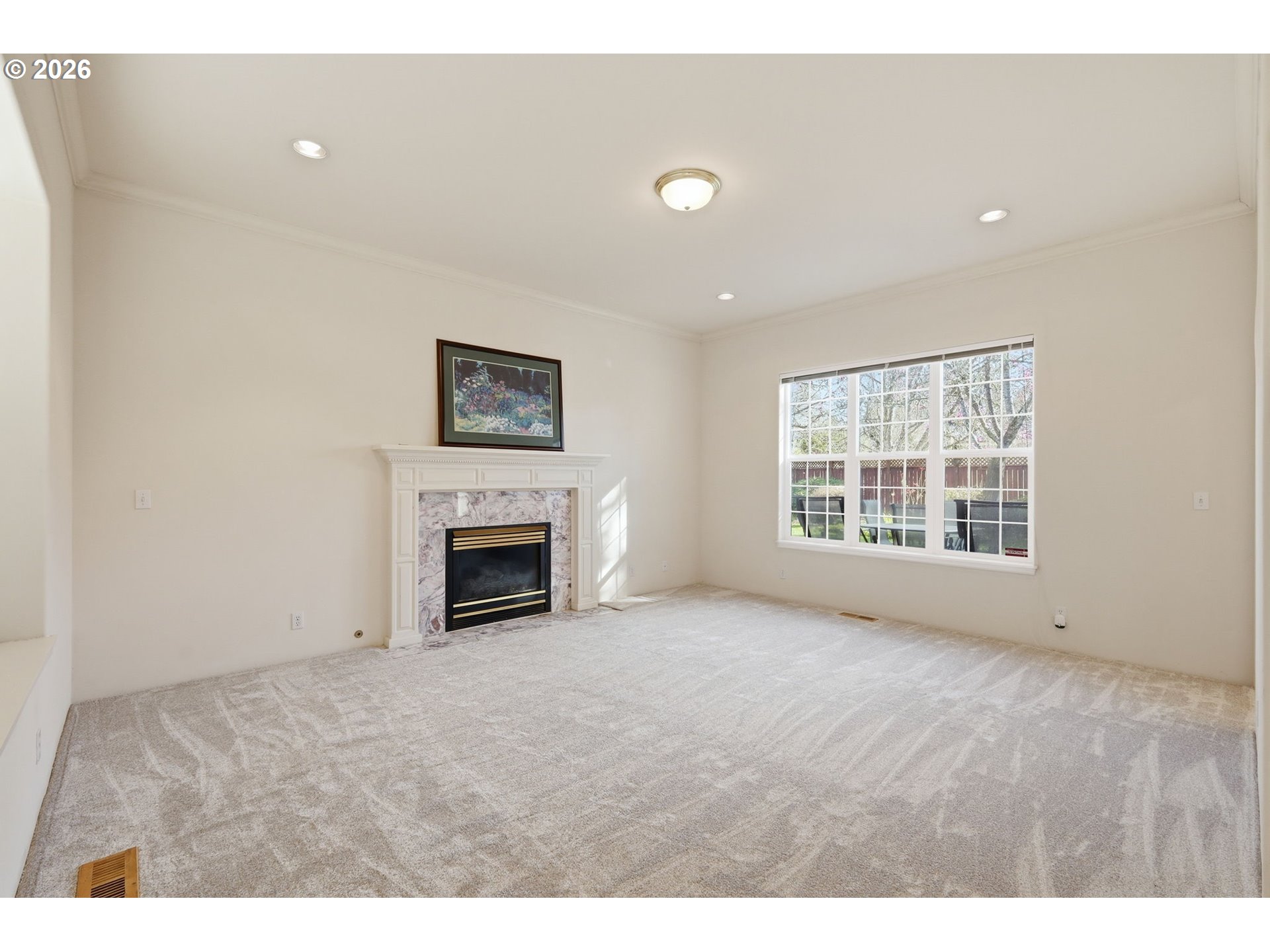 3379 South Lambert Street Eugene, OR 97405 - Photo 6 of 44 a view of empty room with a fireplace
