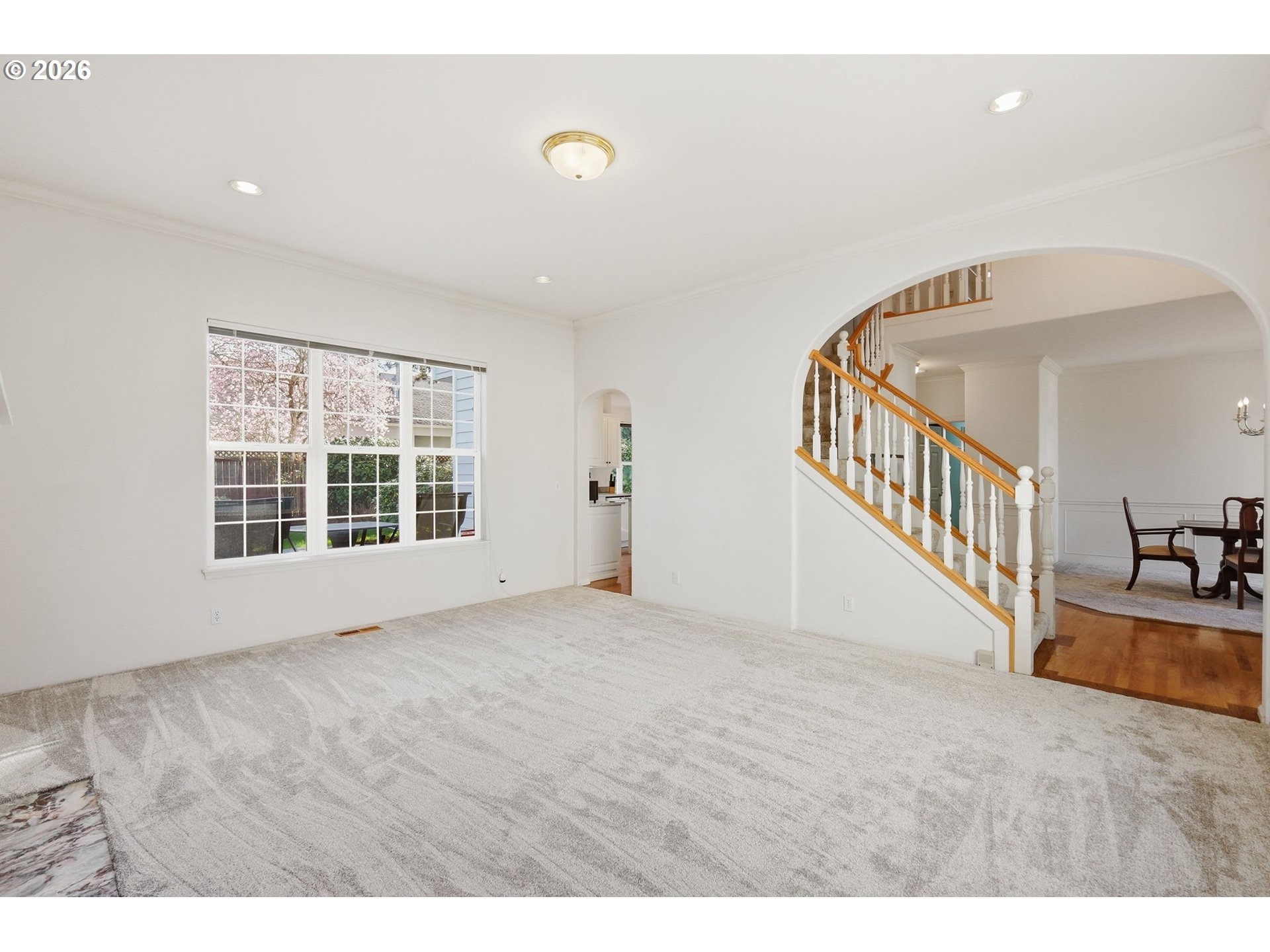 3379 South Lambert Street Eugene, OR 97405 - Photo 7 of 44 a view of an empty room with wooden floor and windows