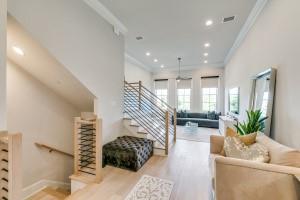 4125 Runyon Road Addison, TX 75001 - Photo 1 of 1 a living room with furniture and a potted plant