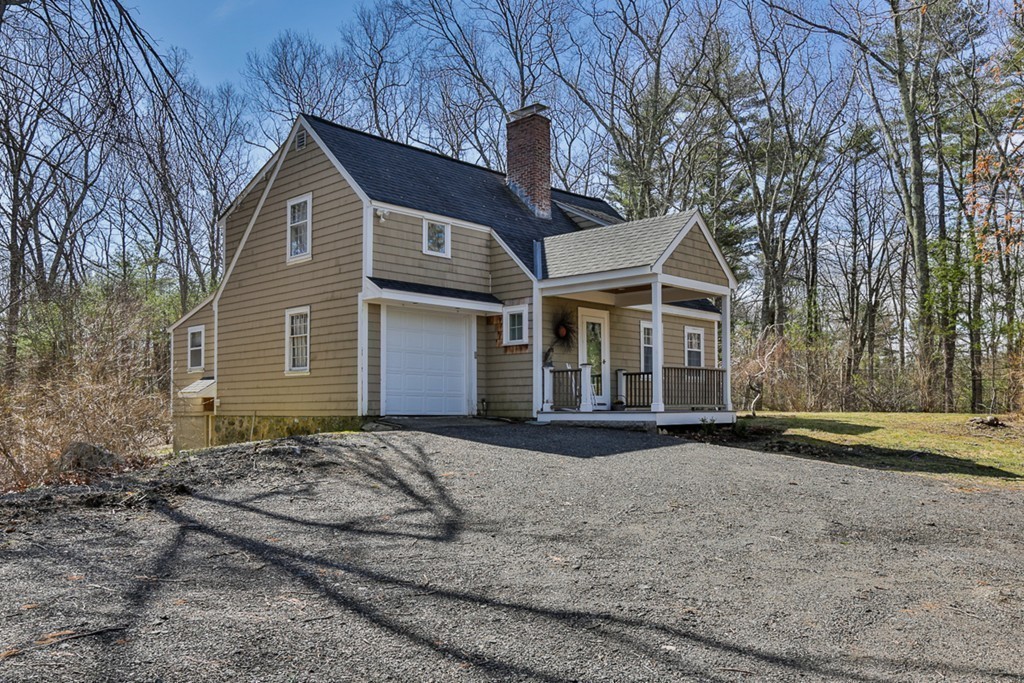 31 Depot Road Boxford, MA 01921 - Photo 1 of 30 a front view of a house with a yard