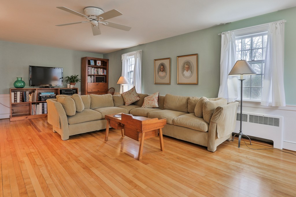 31 Depot Road Boxford, MA 01921 - Photo 4 of 30 a living room with furniture and a flat screen tv