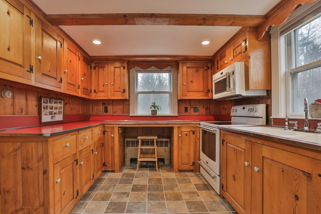 31 Depot Road Boxford, MA 01921 - Photo 8 of 30 a kitchen with stainless steel appliances granite countertop a sink and cabinets