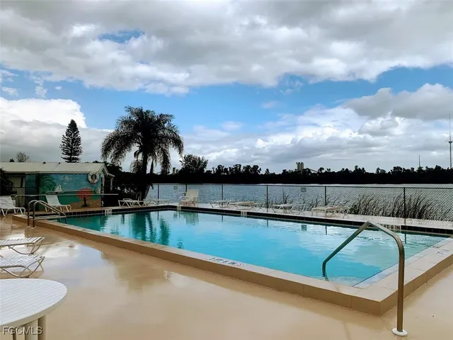 swimming pool with outdoor seating