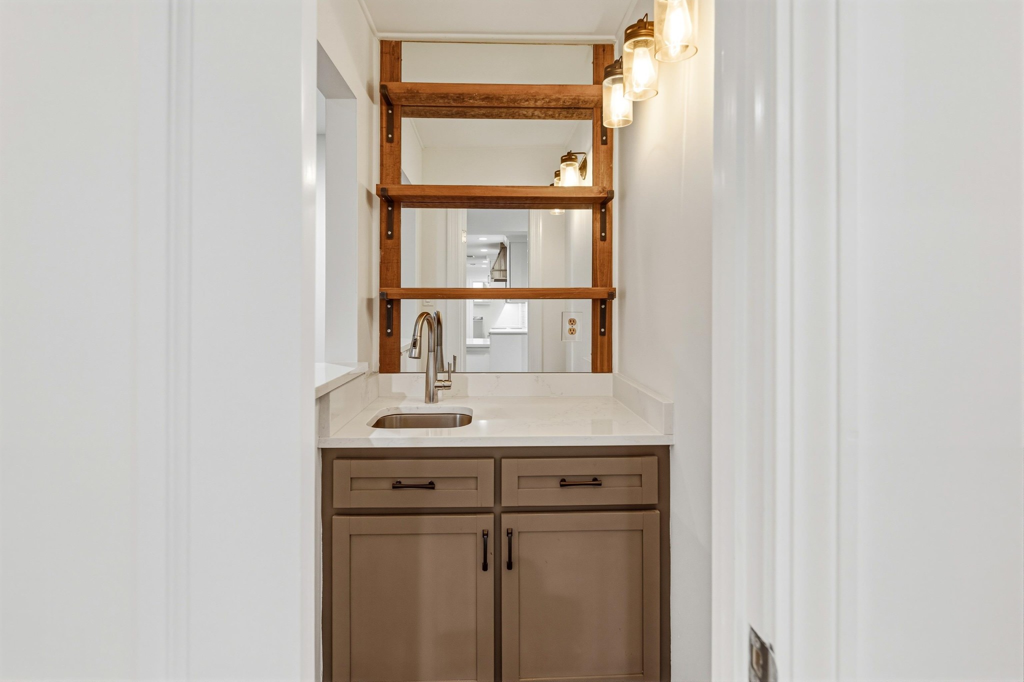 2115 Brierbrook Road Memphis, TN 38138 - Photo 12 of 40 a bathroom with a sink and a mirror