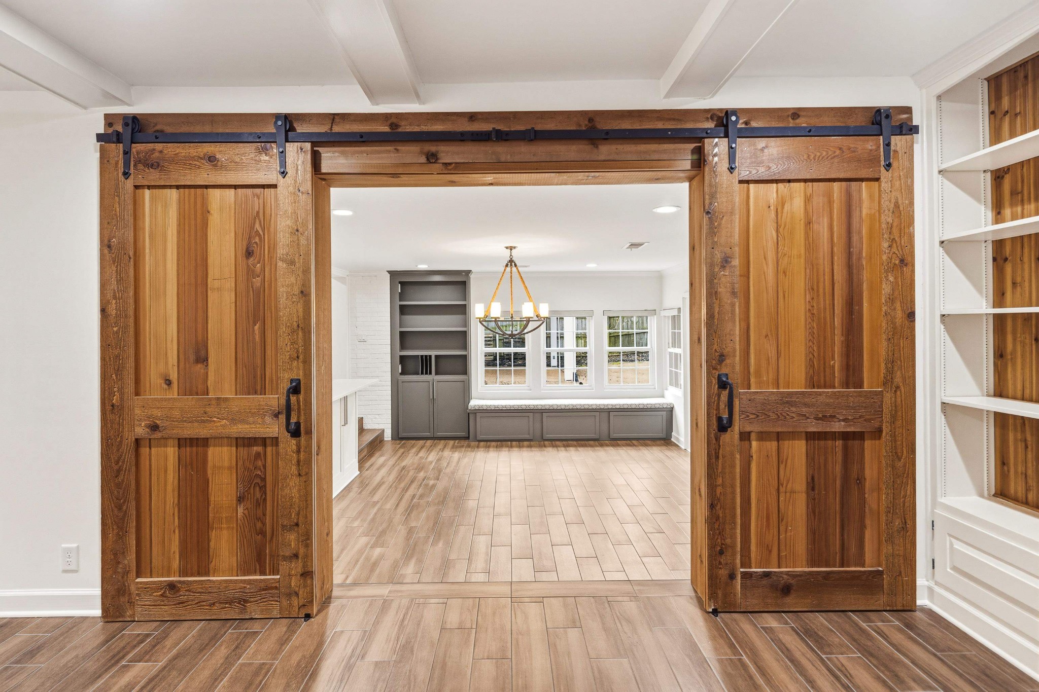 2115 Brierbrook Road Memphis, TN 38138 - Photo 14 of 40 walk in closet with window and hardwood floor