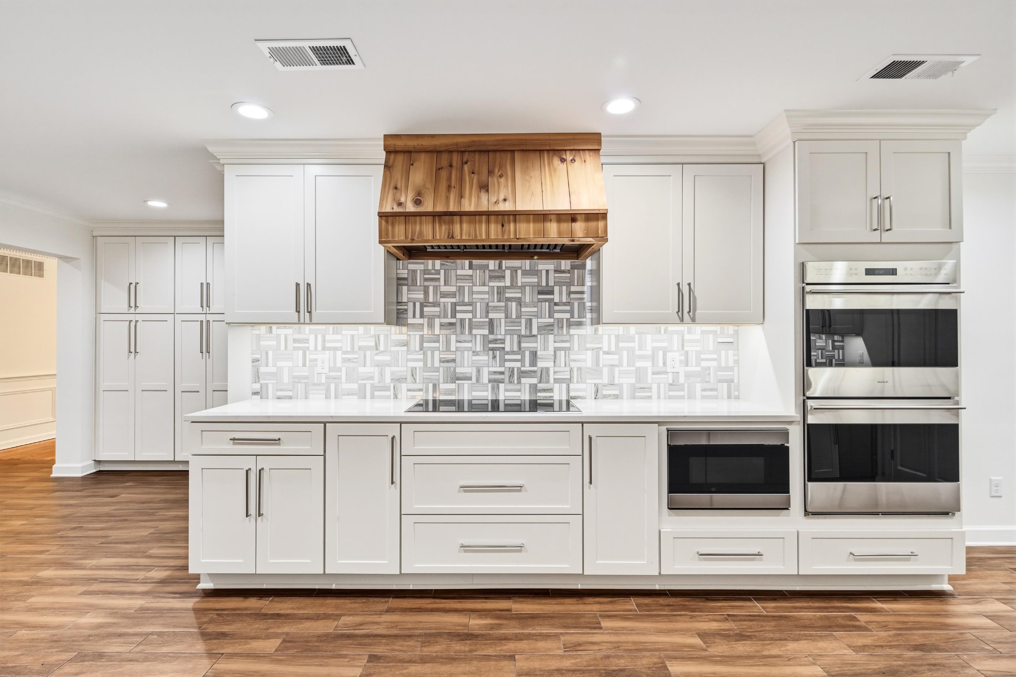 2115 Brierbrook Road Memphis, TN 38138 - Photo 19 of 40 a kitchen with stainless steel appliances granite countertop a stove and a microwave
