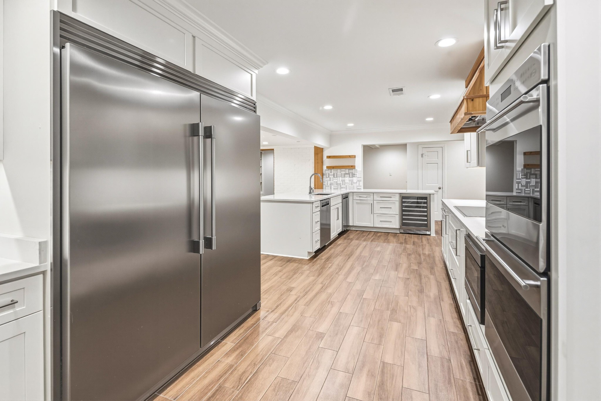 2115 Brierbrook Road Memphis, TN 38138 - Photo 20 of 40 a kitchen with a refrigerator and a sink