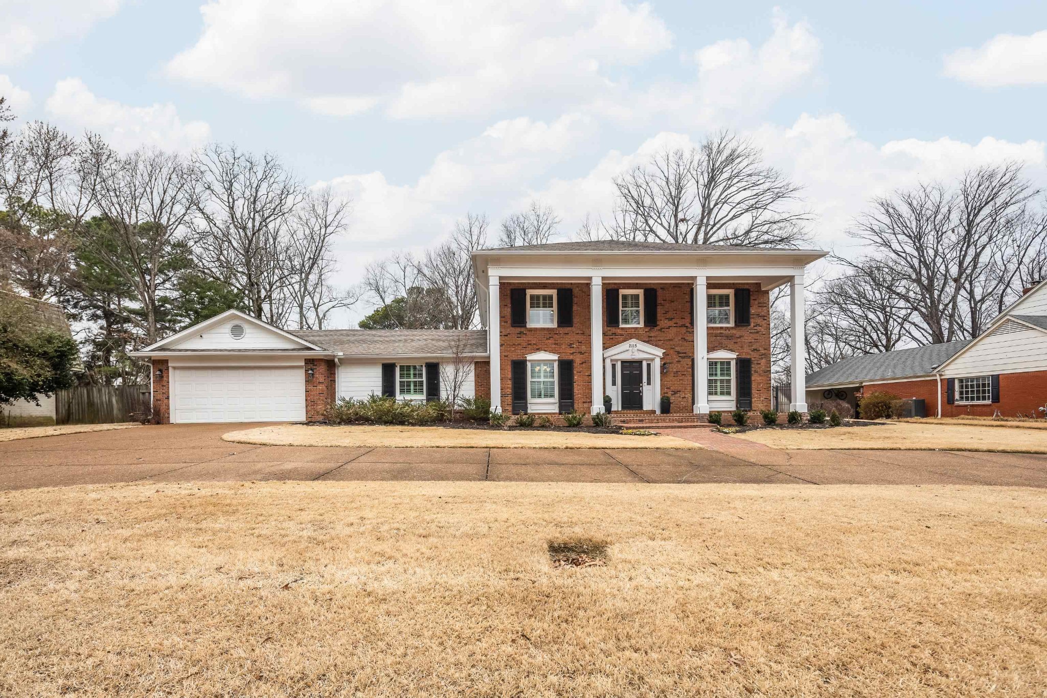 2115 Brierbrook Road Memphis, TN 38138 - Photo 2 of 40 front view of a house with a yard