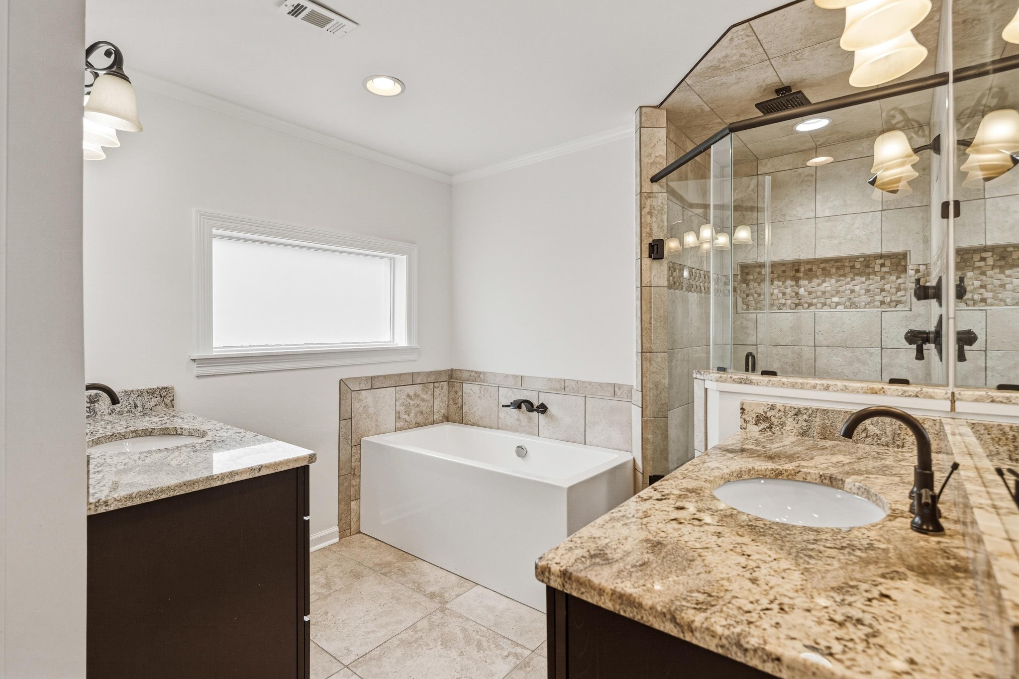 2115 Brierbrook Road Memphis, TN 38138 - Photo 23 of 40 a bathroom with a sink double vanity and a bathtub