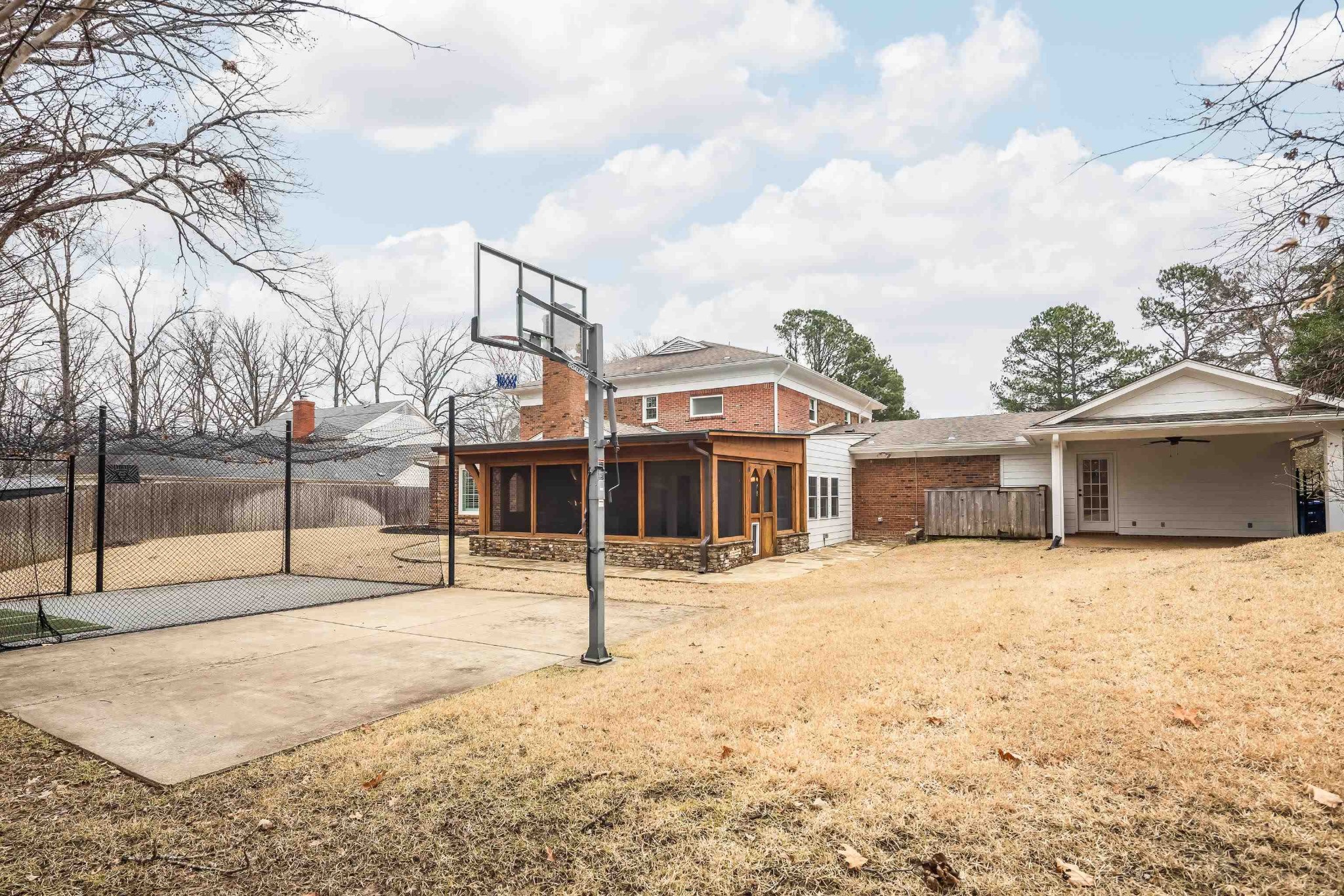 2115 Brierbrook Road Memphis, TN 38138 - Photo 37 of 40 a front view of a house with a yard covered in snow