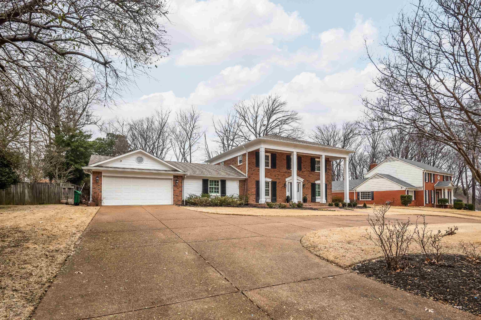 2115 Brierbrook Road Memphis, TN 38138 - Photo 4 of 40 a front view of a house with a yard