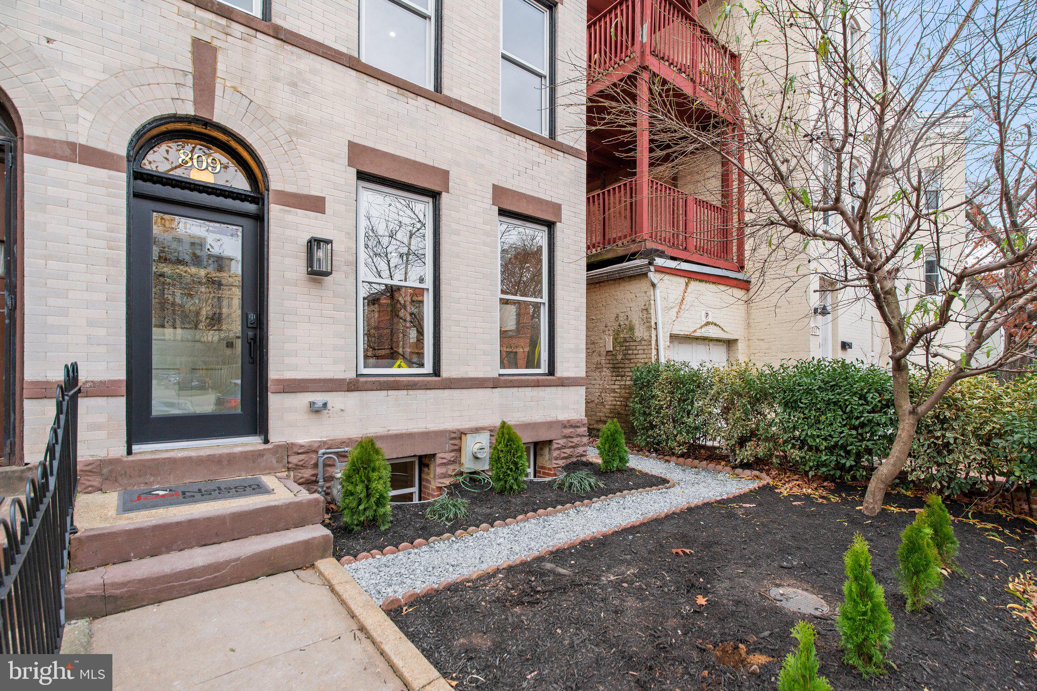 809 G Street Northeast Washington, DC 20002 - Photo 4 of 39 manicured front yard w flowering peach tree