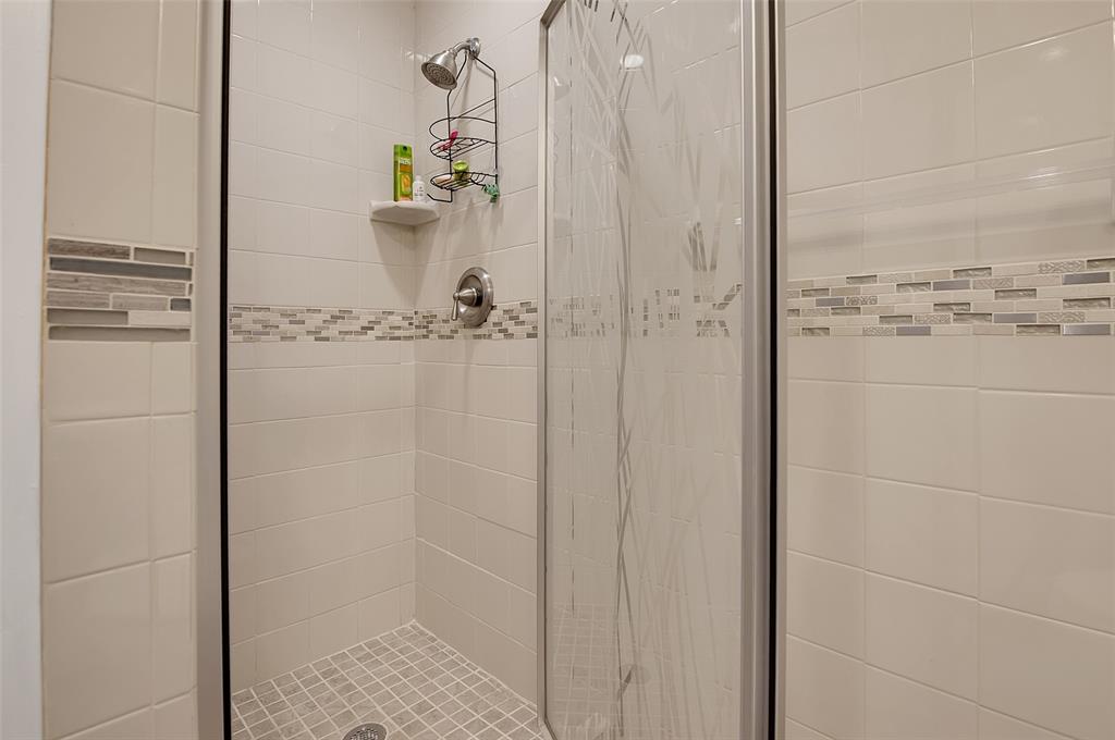 409 Brittany Drive, Unit 409 Delray Beach, FL 33446 - Photo 32 of 41 a bathroom with a shower