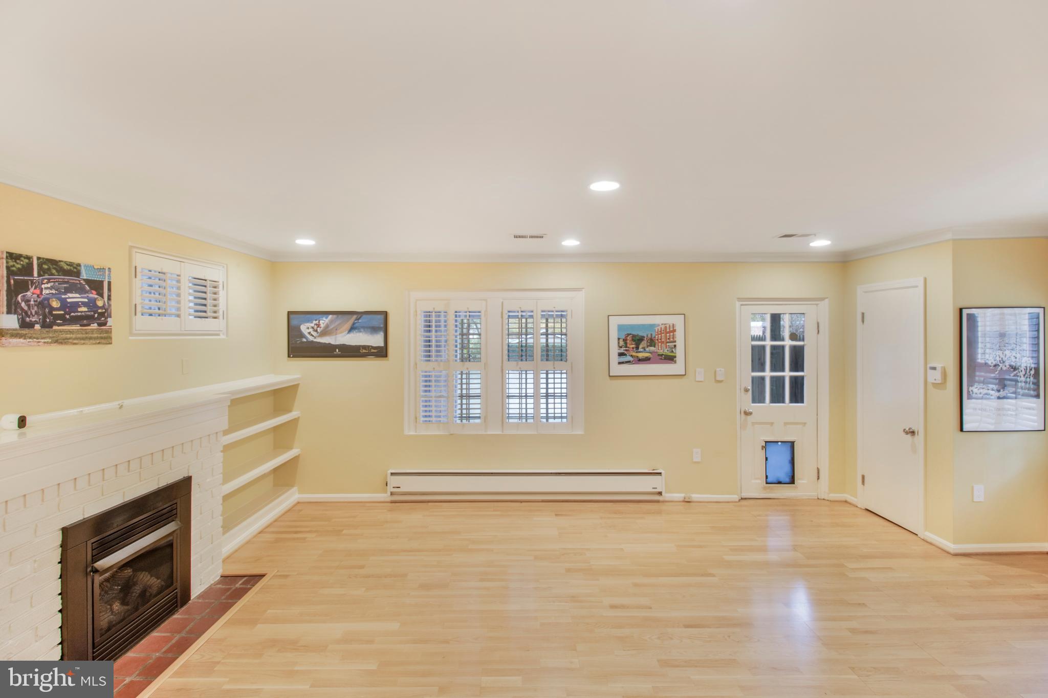 2818 38th Street Northwest Washington, DC 20007 - Photo 30 of 43 Rec Room with fireplace