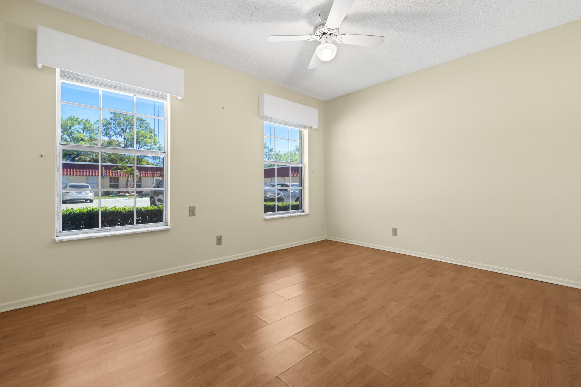 251 Down E Lane Lake Worth, FL 33467 - Photo 13 of 22 an empty room with a window