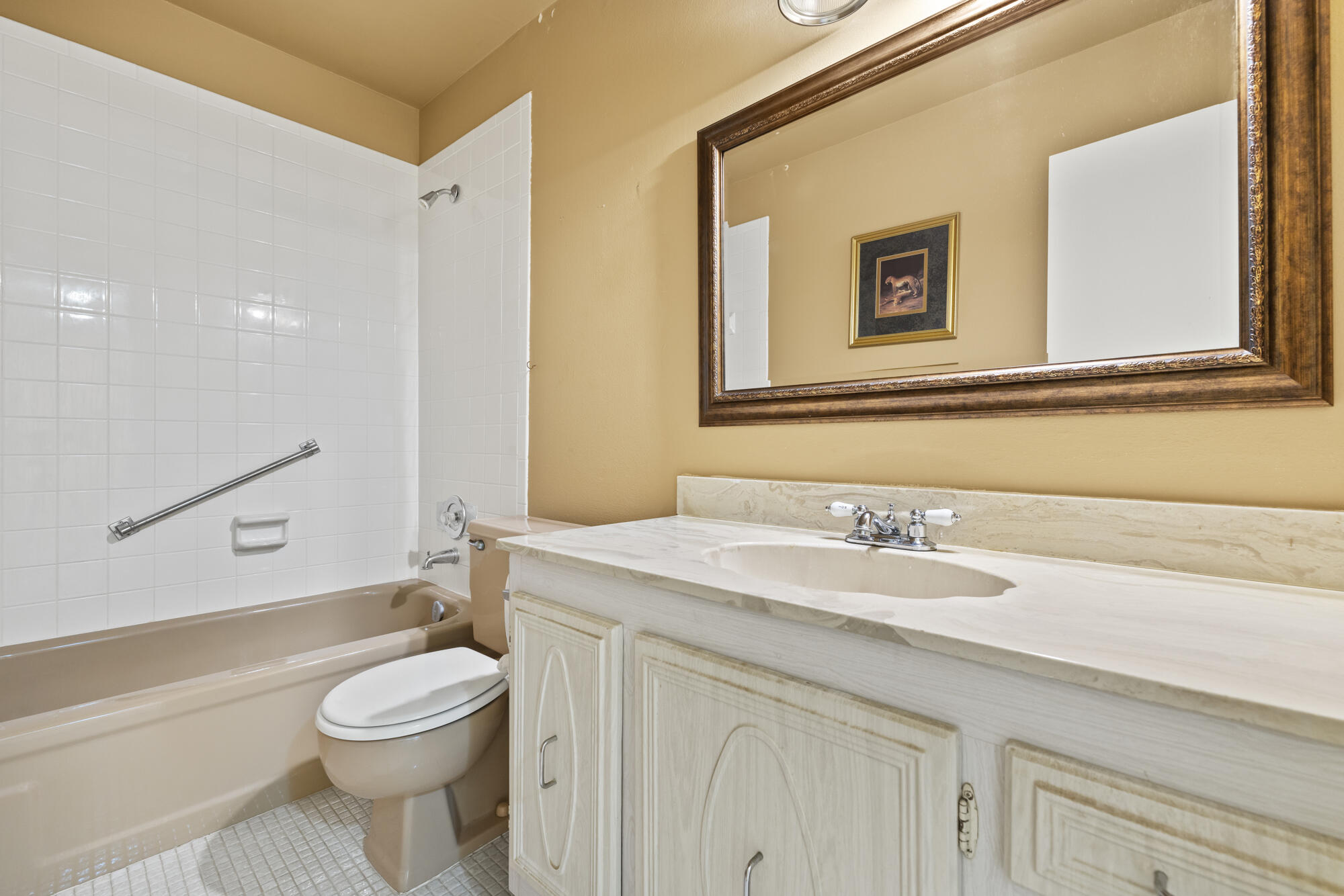 251 Down E Lane Lake Worth, FL 33467 - Photo 15 of 22 a bathroom with a granite countertop sink mirror vanity and toilet
