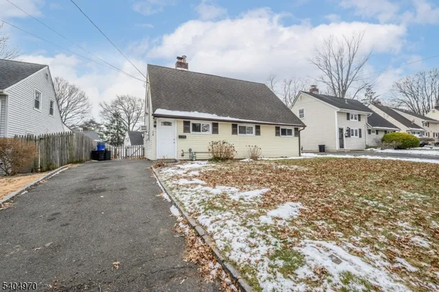 a view of a house with a street