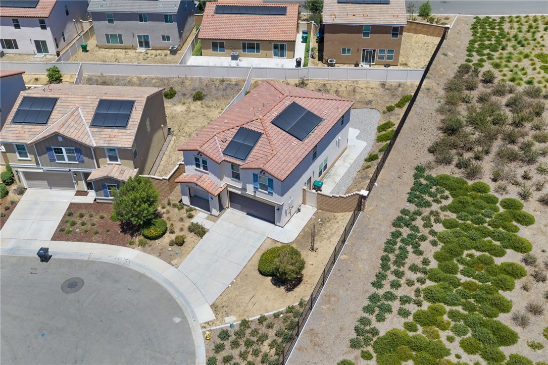 20130 Curaco Court Riverside, CA 92507 - Photo 8 of 43 Aerial front view showing the home’s position near the end of the street.