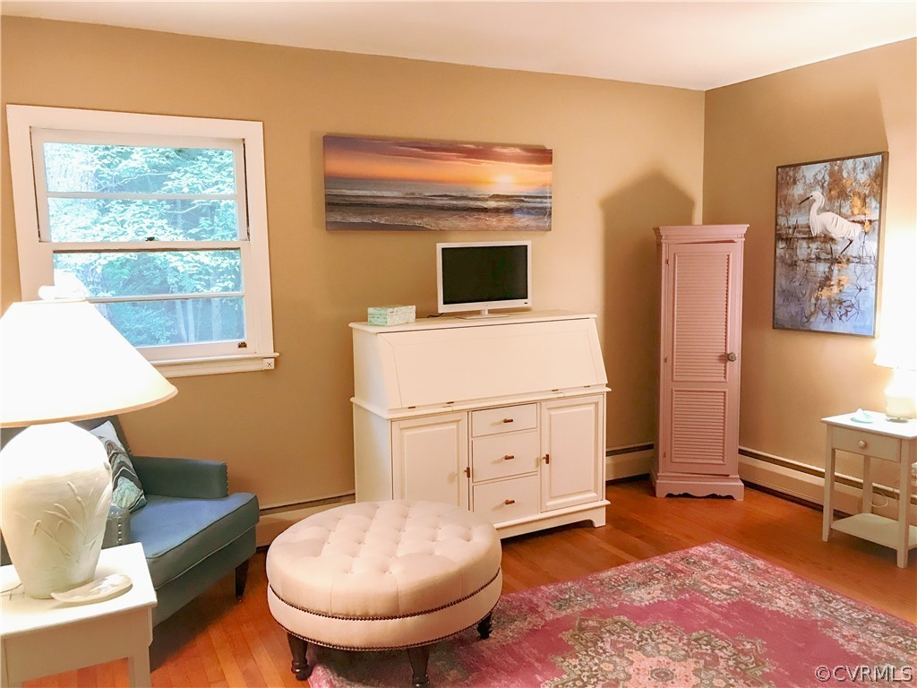 11716 Boyd Road Chester, VA 23831 - Photo 11 of 23 a room with furniture and a wooden floor
