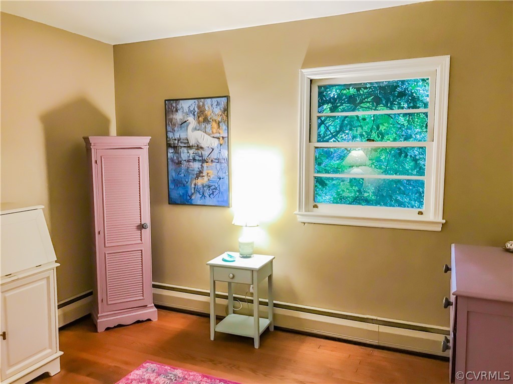 11716 Boyd Road Chester, VA 23831 - Photo 12 of 23 a living room with a dresser and a window