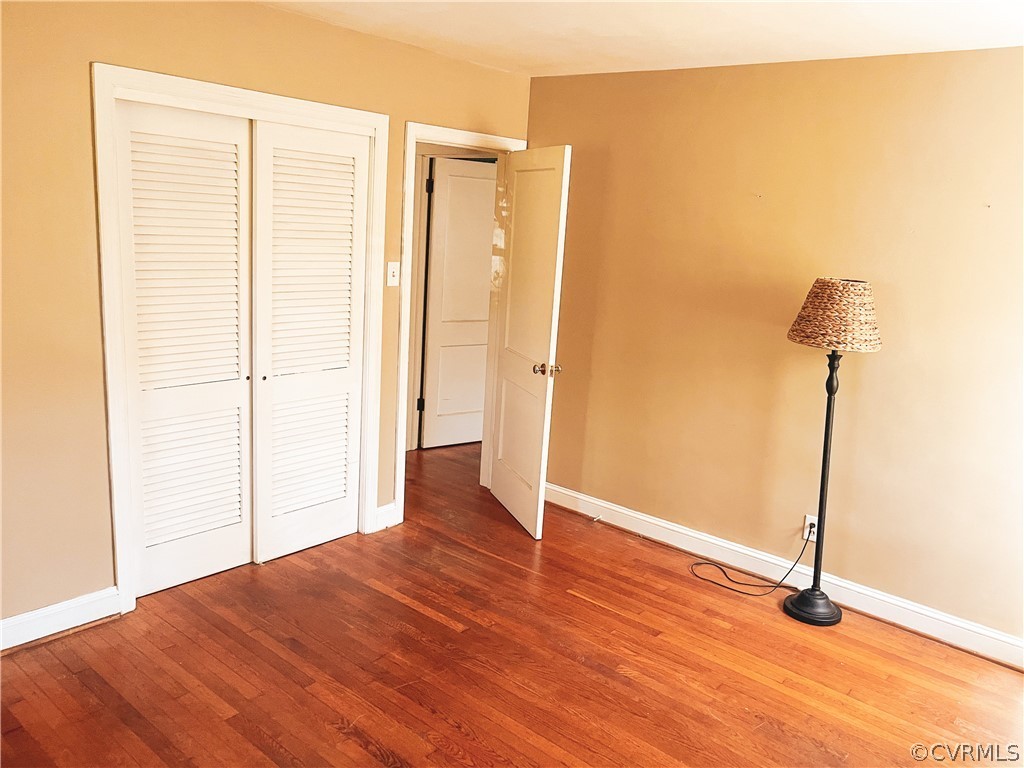 11716 Boyd Road Chester, VA 23831 - Photo 13 of 23 a view of empty room with wooden floor