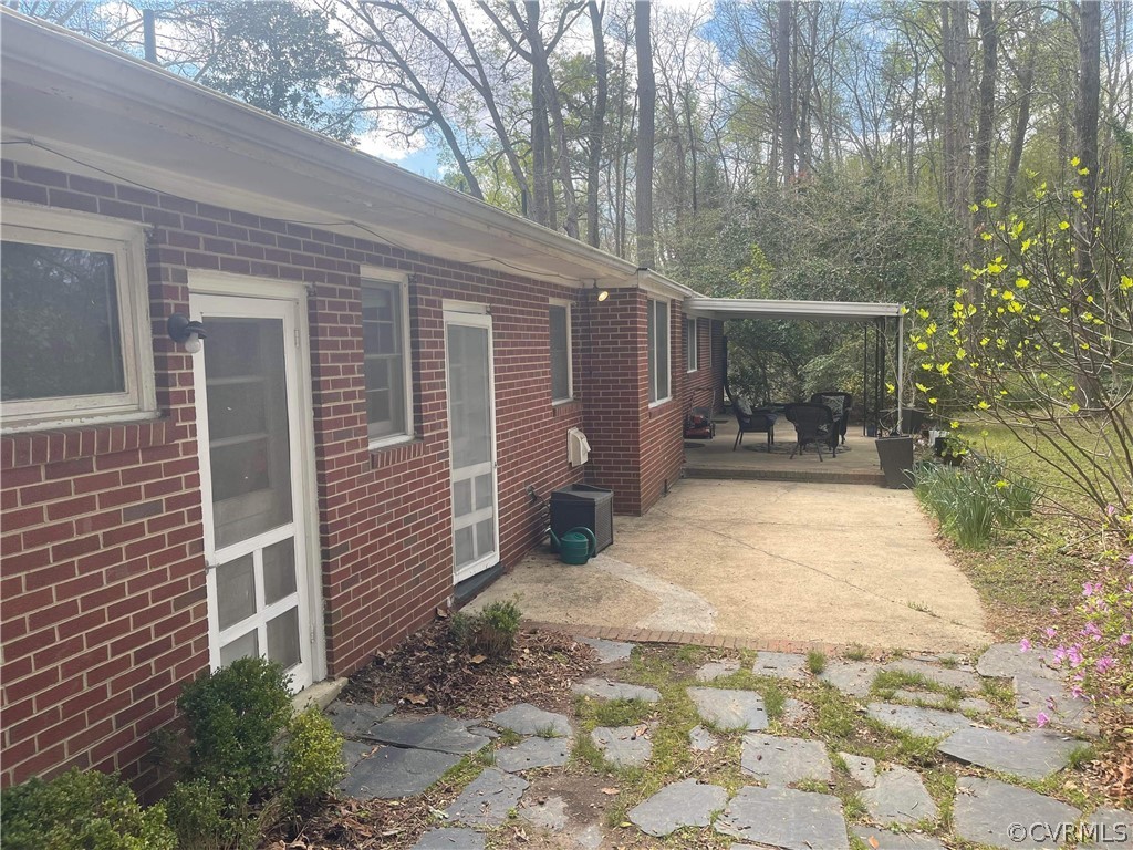 11716 Boyd Road Chester, VA 23831 - Photo 15 of 23 a view of a back yard of the house