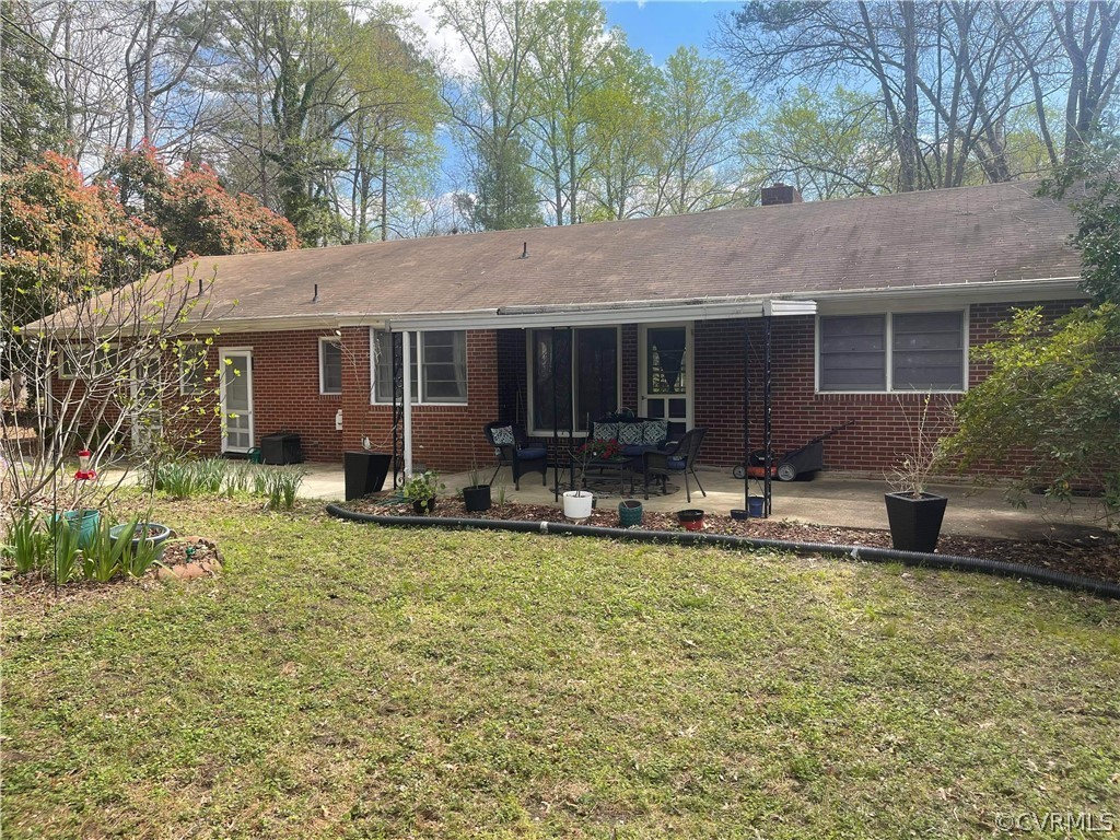 11716 Boyd Road Chester, VA 23831 - Photo 16 of 23 front view of a house with a yard