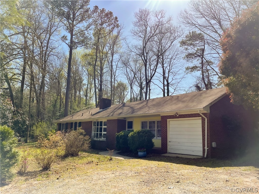11716 Boyd Road Chester, VA 23831 - Photo 3 of 23 a front view of a house with a yard