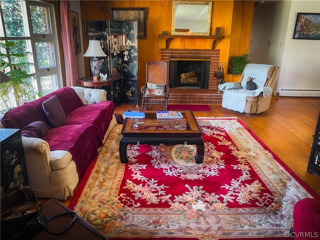 11716 Boyd Road Chester, VA 23831 - Photo 5 of 23 a living room with furniture and a fireplace