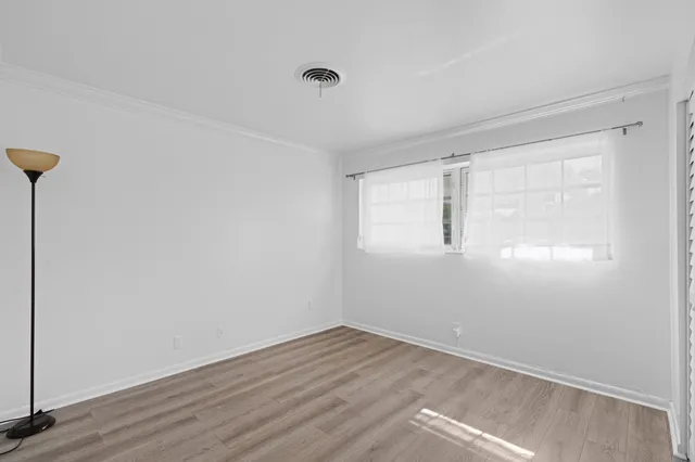 a view of a hallway with closet