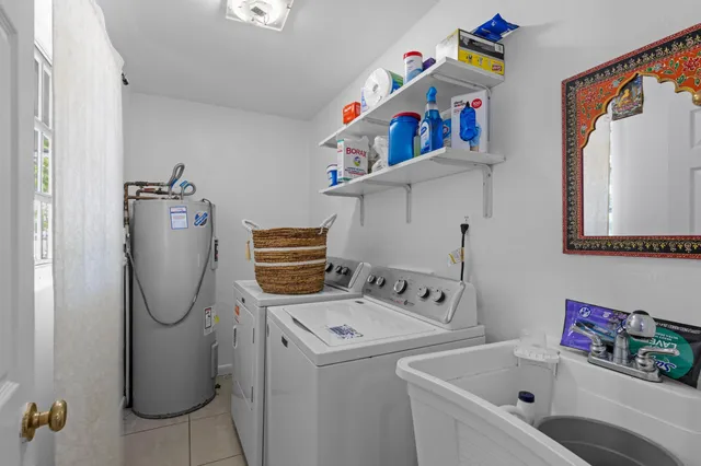 an aerial view of residential house with an outdoor space