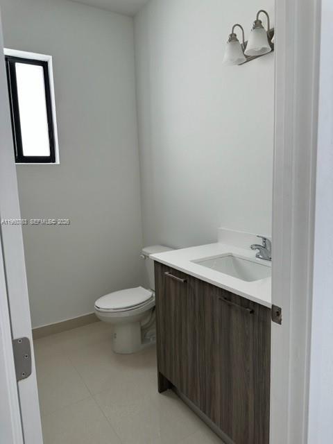 15814 Southwest 136 Way Miami, FL 33196 - Photo 23 of 33 a bathroom with a sink and a toilet