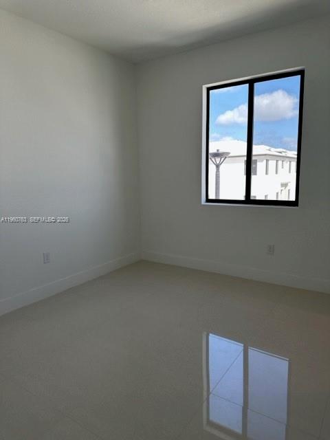 15814 Southwest 136 Way Miami, FL 33196 - Photo 24 of 33 an empty room with a window