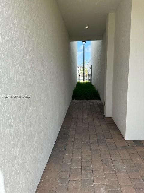 15814 Southwest 136 Way Miami, FL 33196 - Photo 30 of 33 a view of a hallway with a window