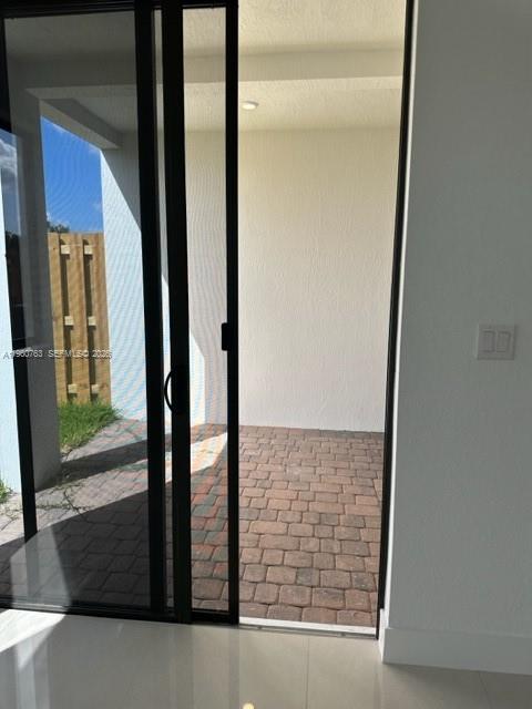 15814 Southwest 136 Way Miami, FL 33196 - Photo 9 of 33 a view of an entryway