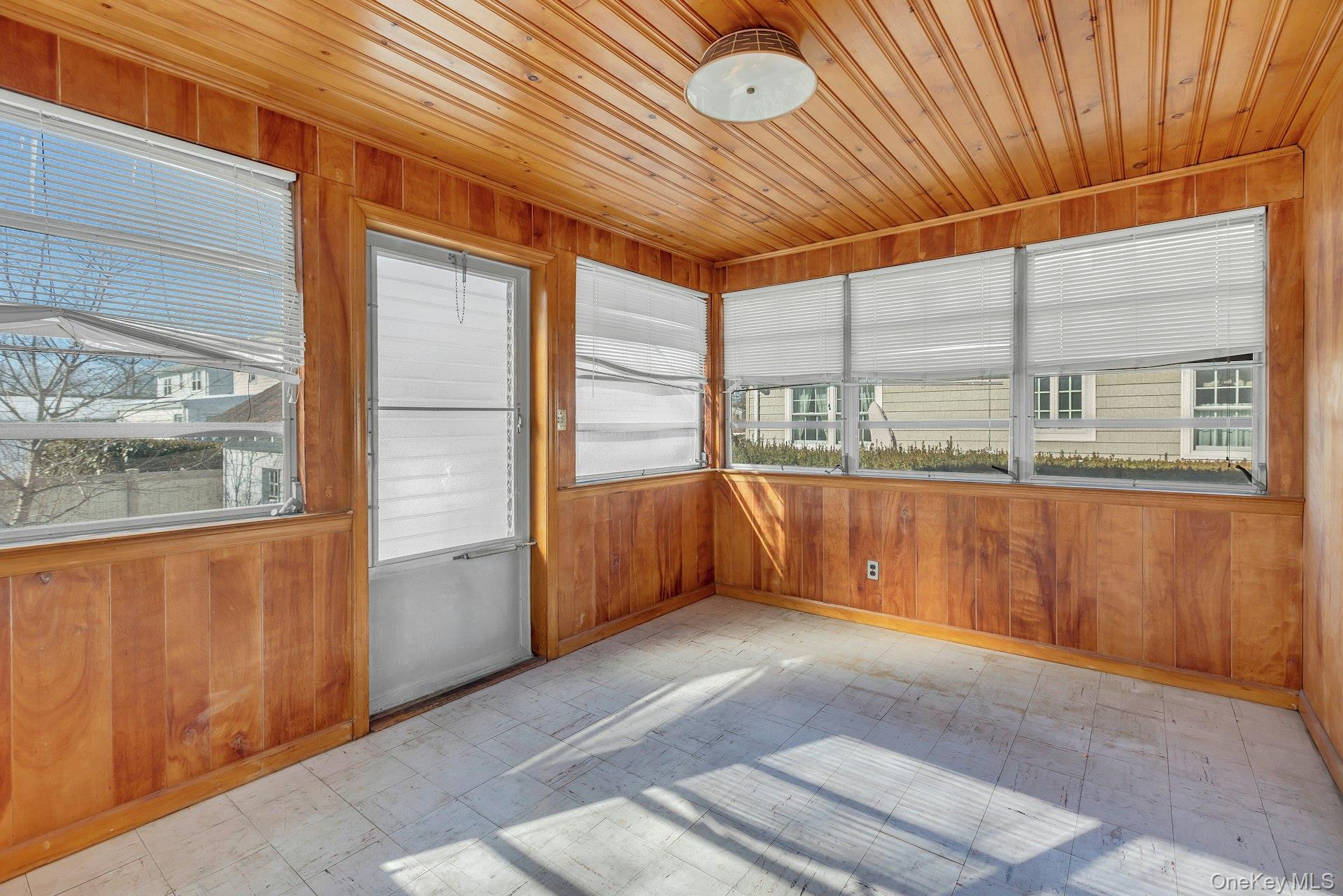463 South 3rd Street Lindenhurst, NY 11757 - Photo 11 of 24 a view of an empty room with a window