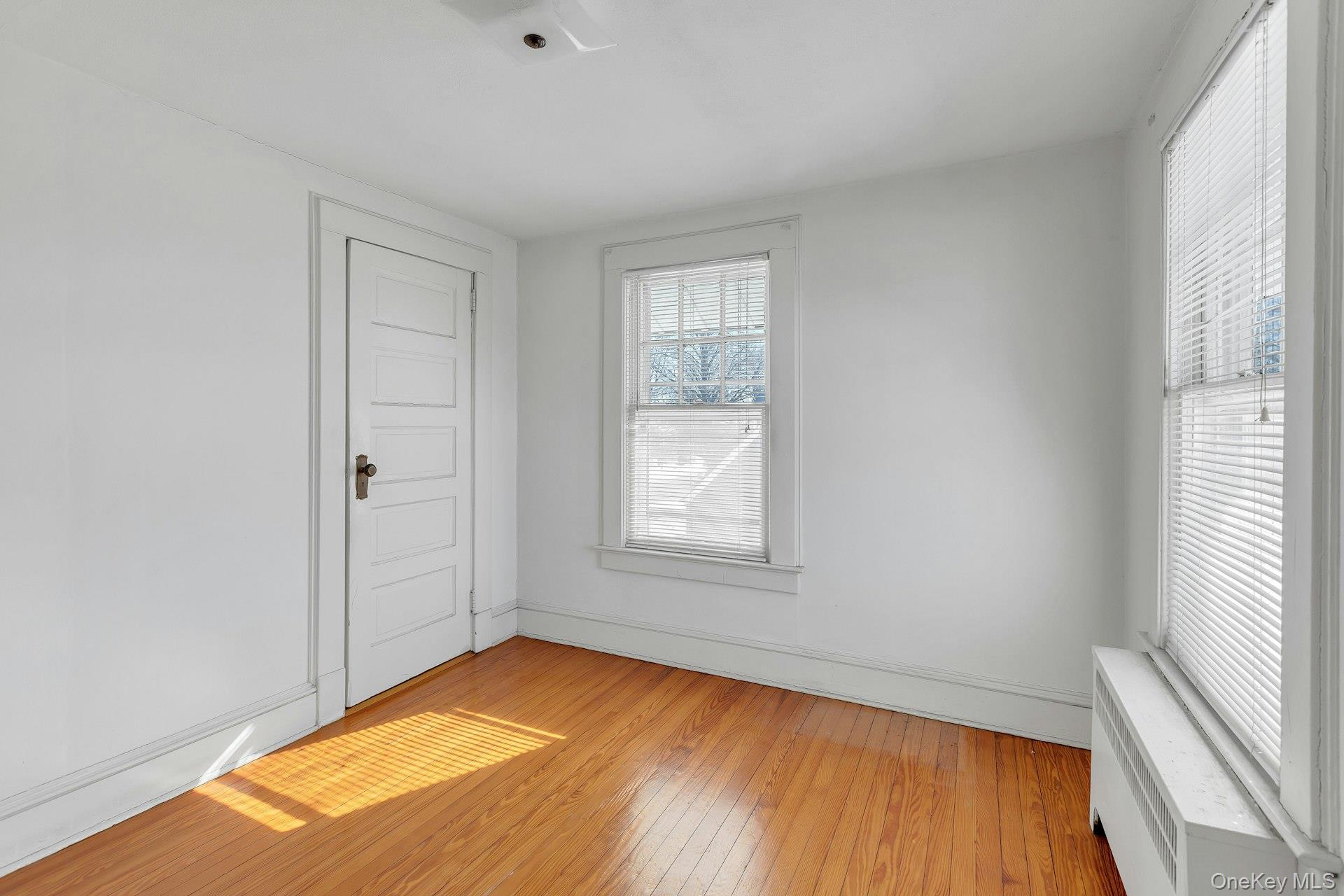 463 South 3rd Street Lindenhurst, NY 11757 - Photo 17 of 24 an empty room with window