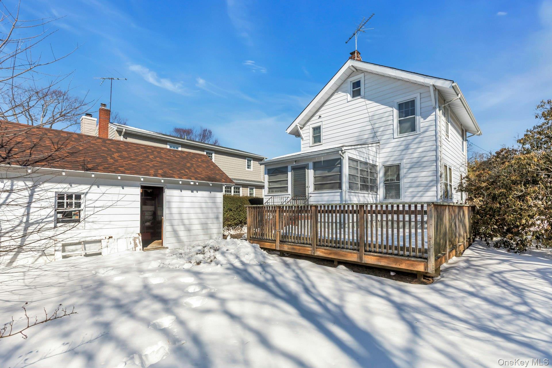 463 South 3rd Street Lindenhurst, NY 11757 - Photo 20 of 24 a view of a house with wooden fence