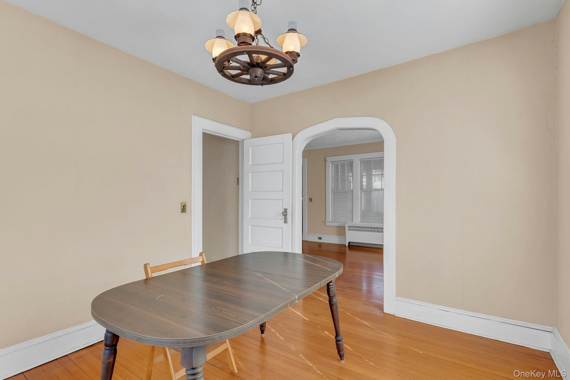 463 South 3rd Street Lindenhurst, NY 11757 - Photo 7 of 24 a view of a dining room with a table and chairs
