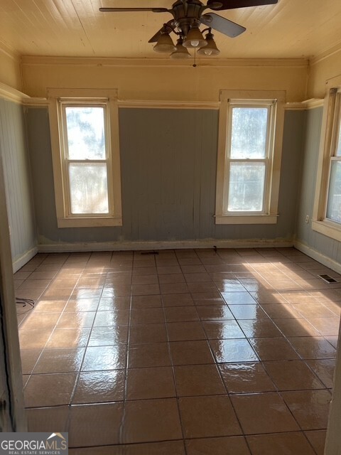 6 Derrick Avenue Hampton, GA 30228 - Photo 6 of 12 a view of empty room with windows