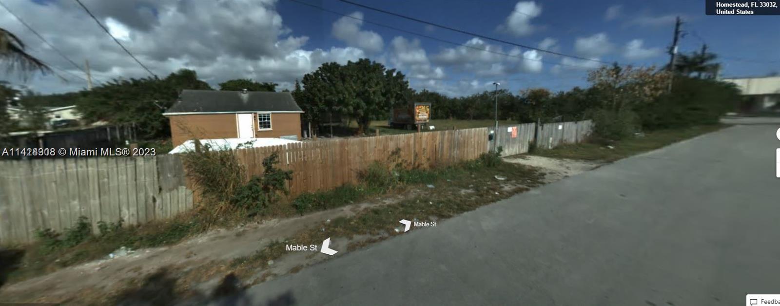 26430 Mable Street Homestead, FL 33032 - Photo 1 of 3 a view of a street