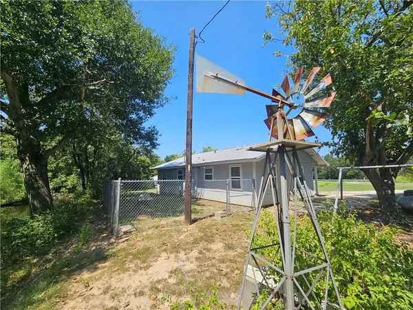a house view with a garden space