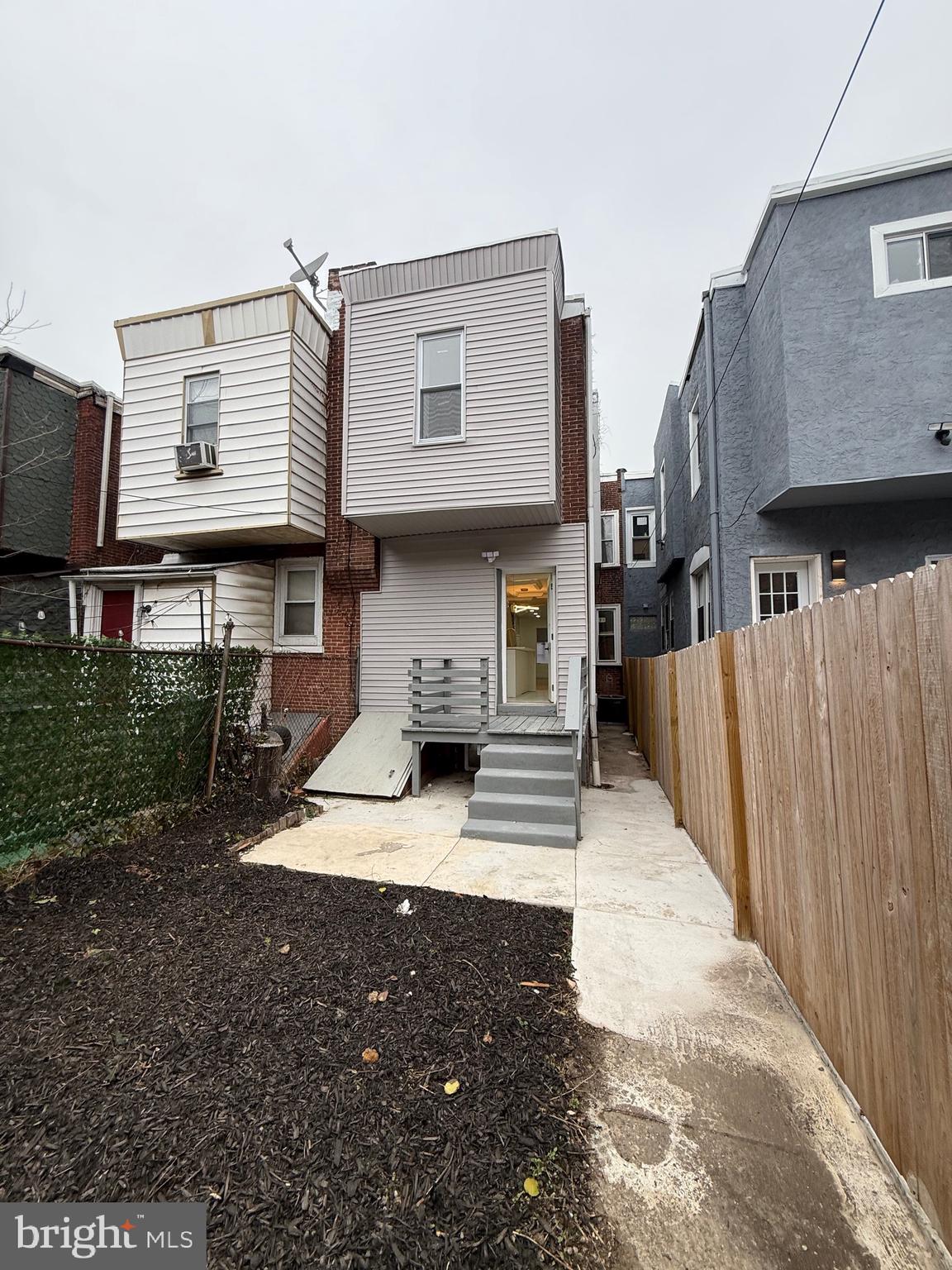 5908 Christian Street Philadelphia, PA 19143 - Photo 17 of 41 a view of a house with backyard