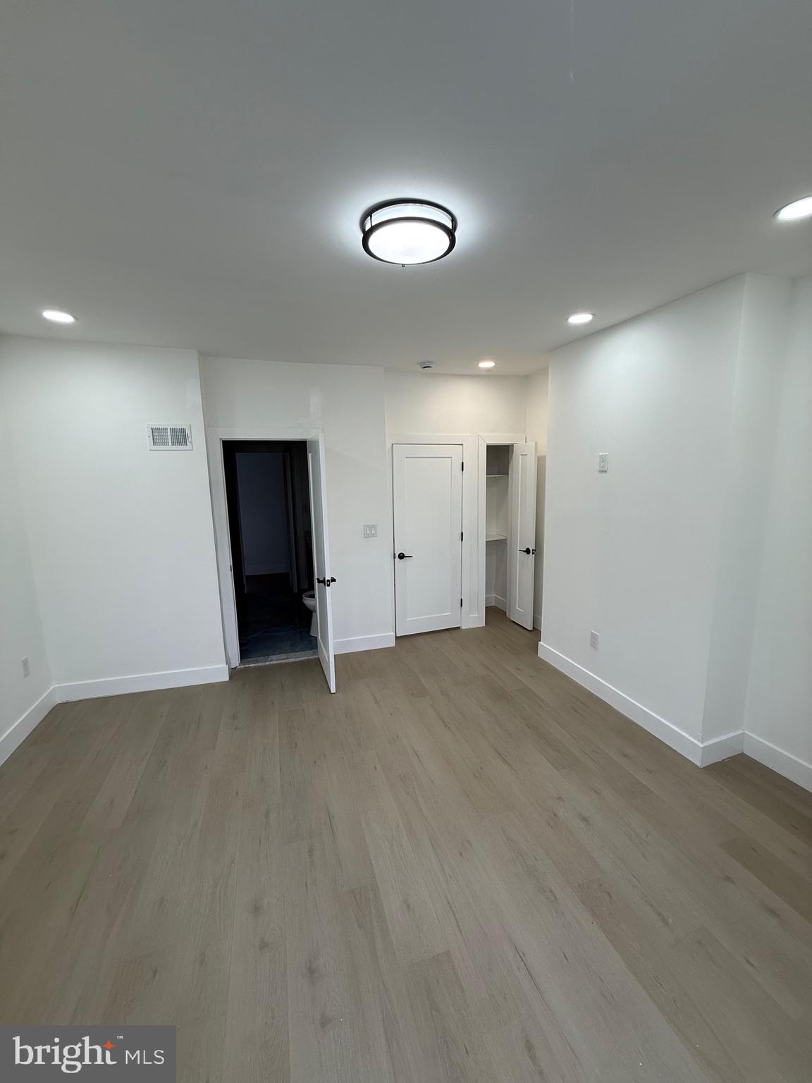 5908 Christian Street Philadelphia, PA 19143 - Photo 29 of 41 an empty room with closet and a bathroom