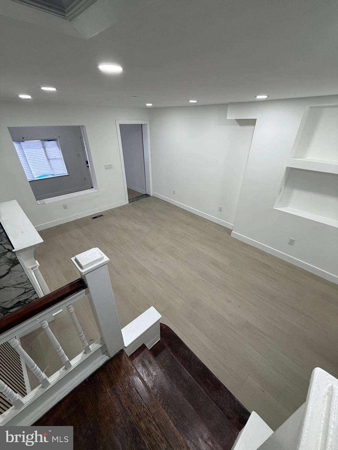5908 Christian Street Philadelphia, PA 19143 - Photo 31 of 41 an empty room with wooden floor